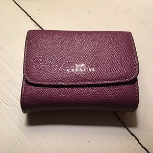 Purple Coach leather wallet